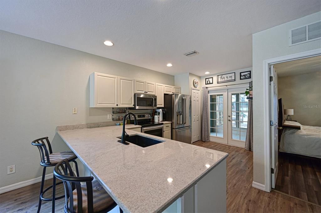 New Granite Countertop and new vinyl flooring