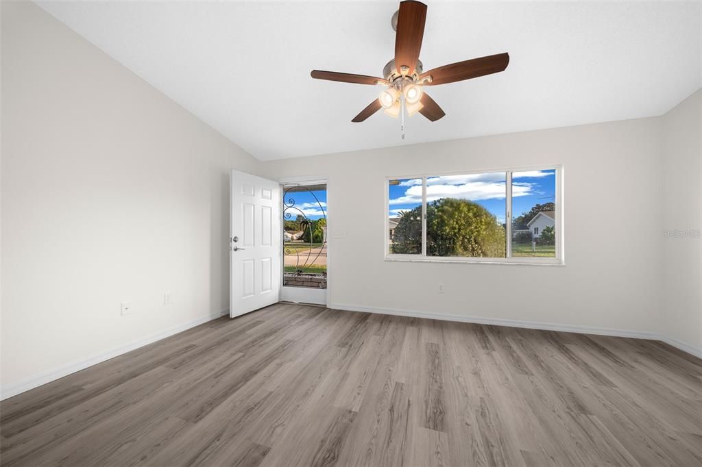 Front door includes a screened door as well.