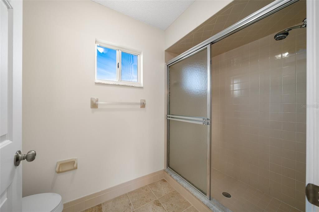 Separate toilet and shower area