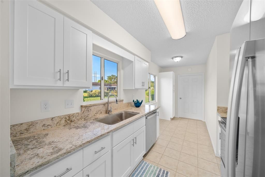 The jewel of the home! New shaker style cabinets with granite countertops