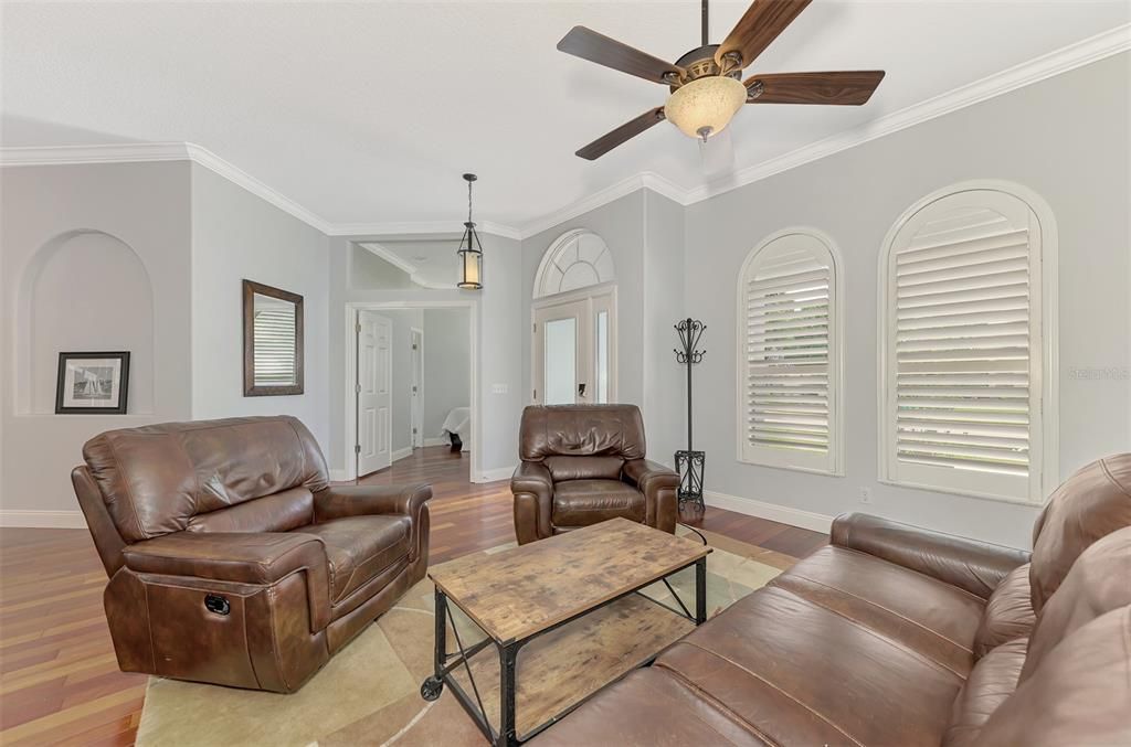 Formal sitting area when you walk in the home. This could also be a great play area.