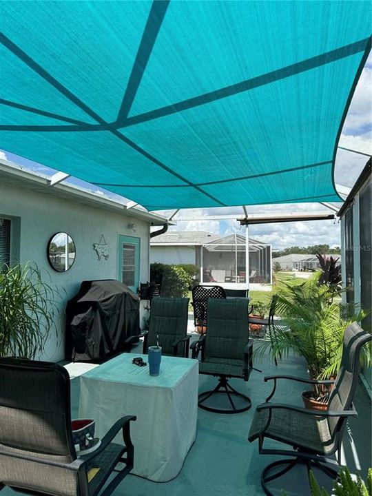 screened patio with TV