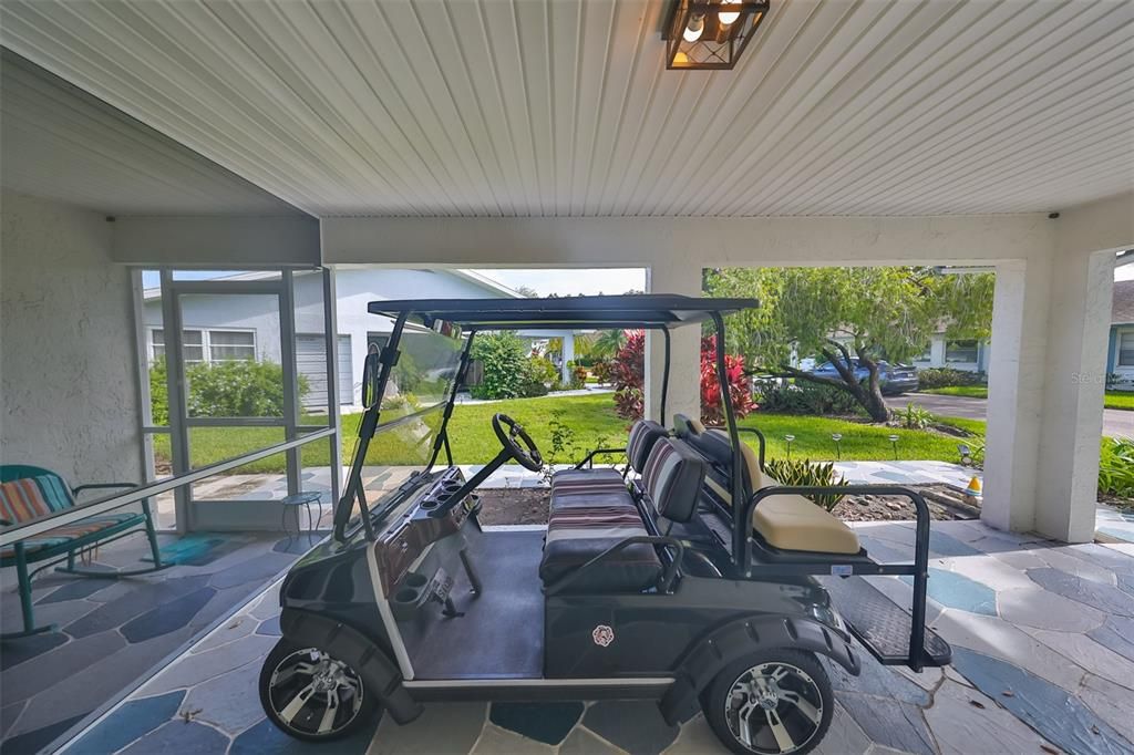 Screened in area. Golf Cart included in Sale.