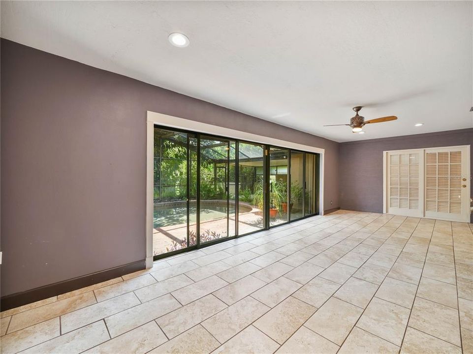 Florida Room with sliding glass doors to pool area