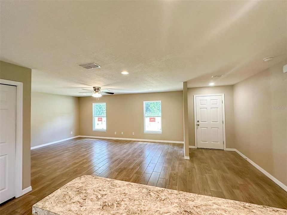 Great room and front entry from kitchen