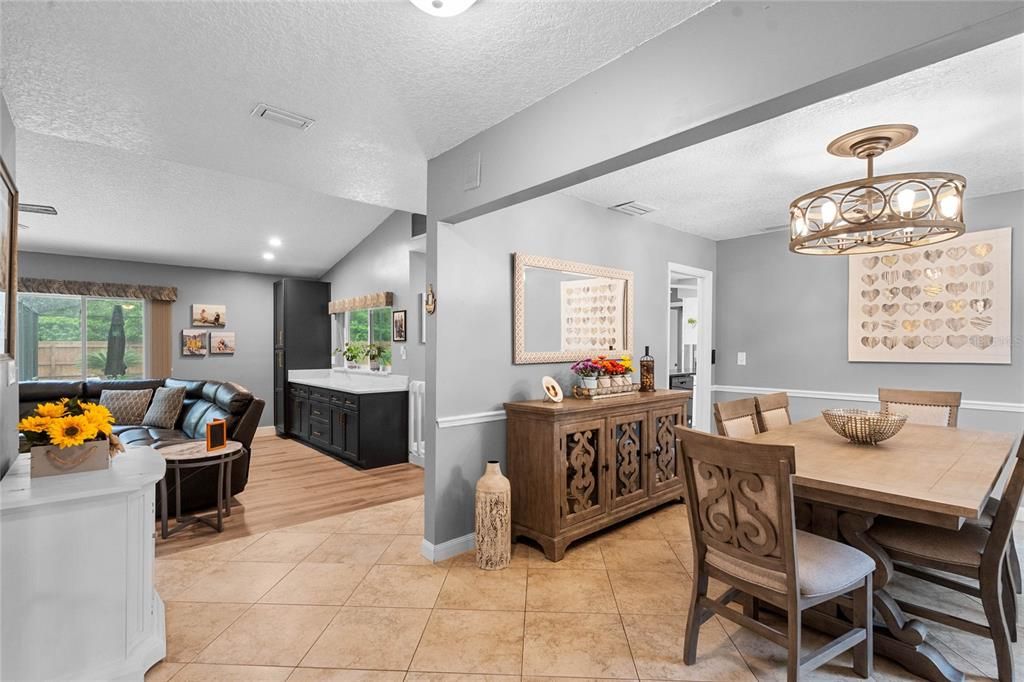 From the foyer, looking toward the dining room to the right and the family room to the left