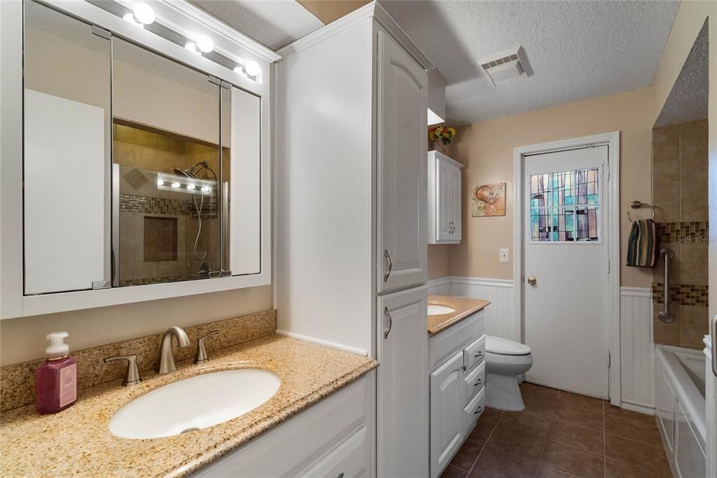 Second bath with double sinks and ample storage