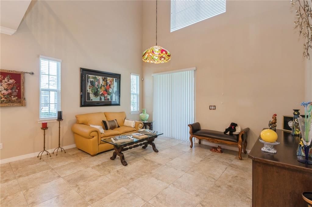 Beautiful tile flooring. Sliding door to screen porch