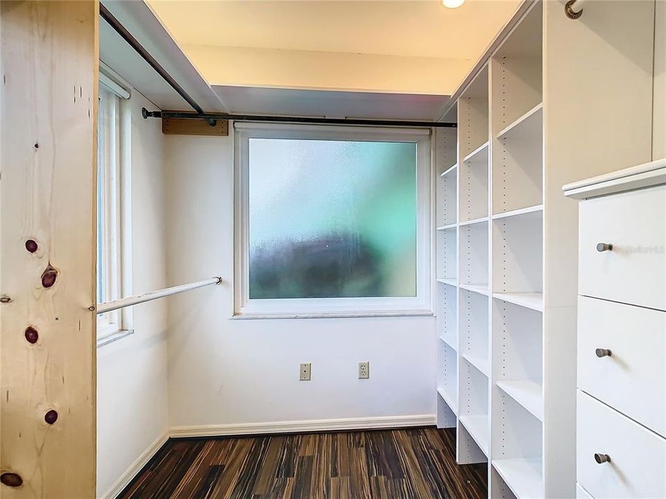 Primary Closet with natural light