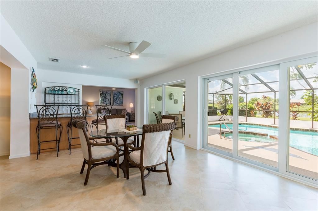 Look at the View Out of the Windows to the Pool Area from the Florida Room