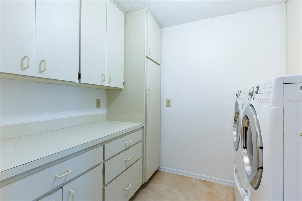 Laundry Room has Plenty of Drawers and Cabinets