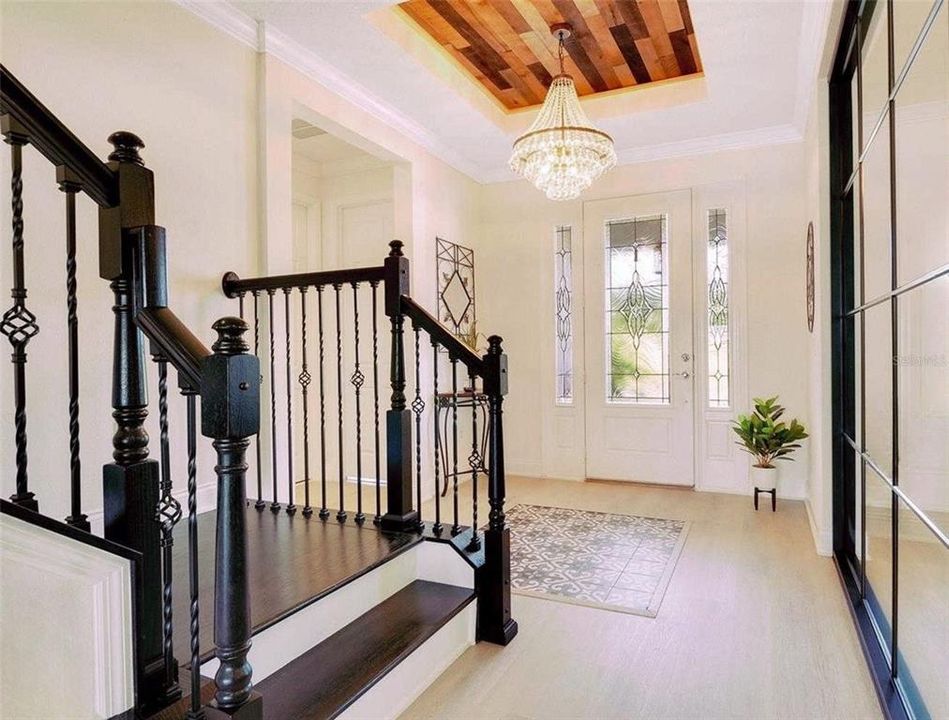 Foyer with Staircase & Office View