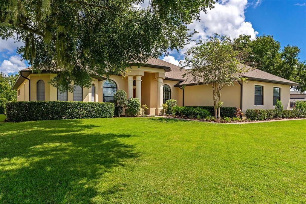 Manicured Lawn with Mature Landscaping