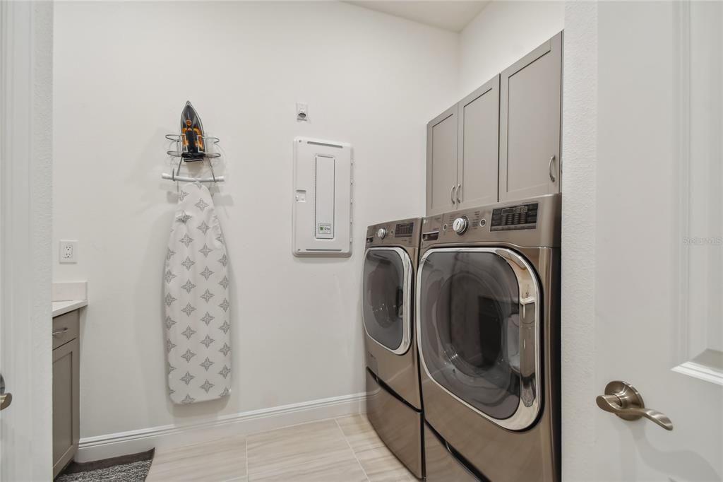 Laundry with built in cabinetry