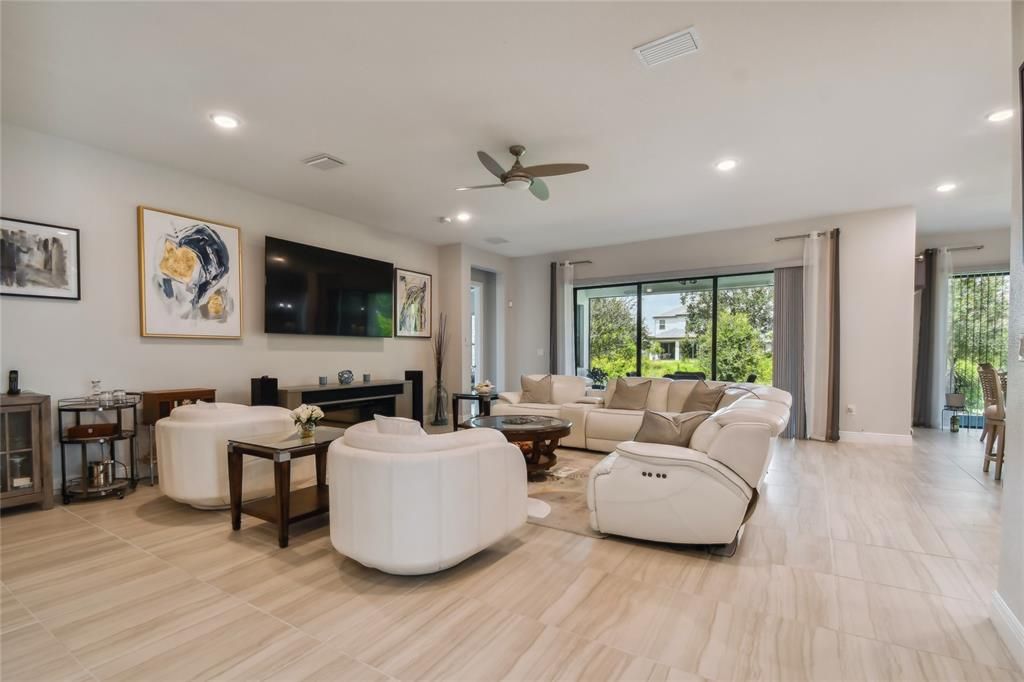 Currently used as a family room/dining room combination, this open floorplan is an extremely flexible / changeable living space.