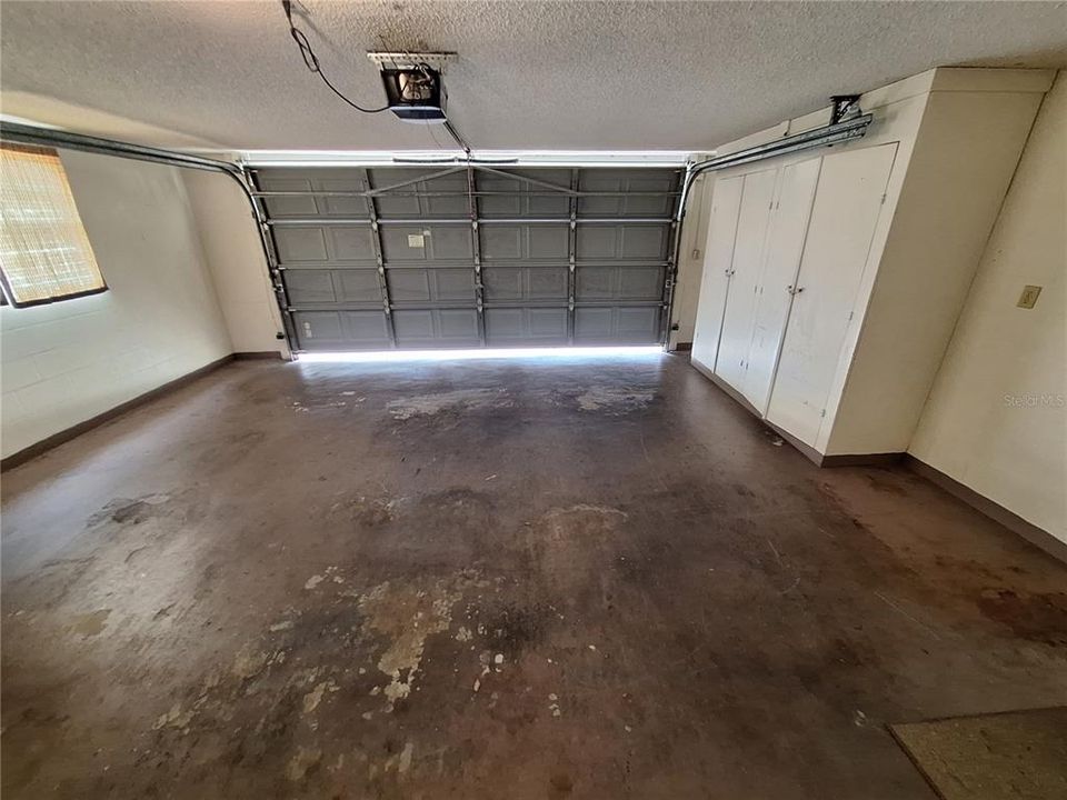 Garage has Storage Cabinets