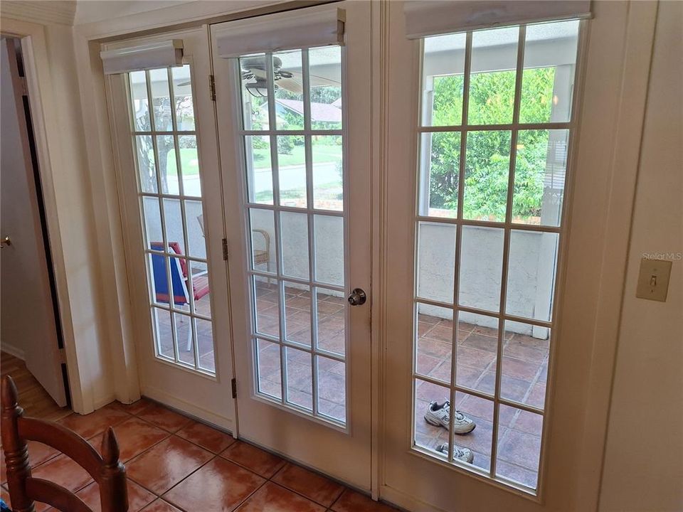 French Doors Line the Wall to the Lanai