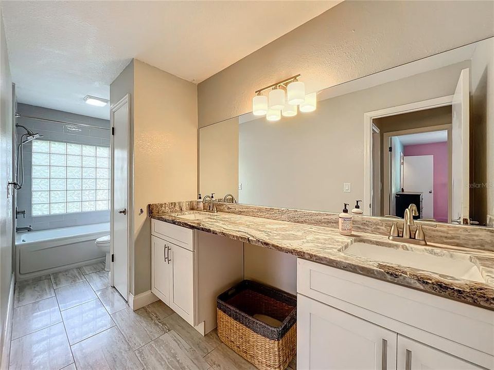 Hall Bath with Double Sinks and Jetted Tub