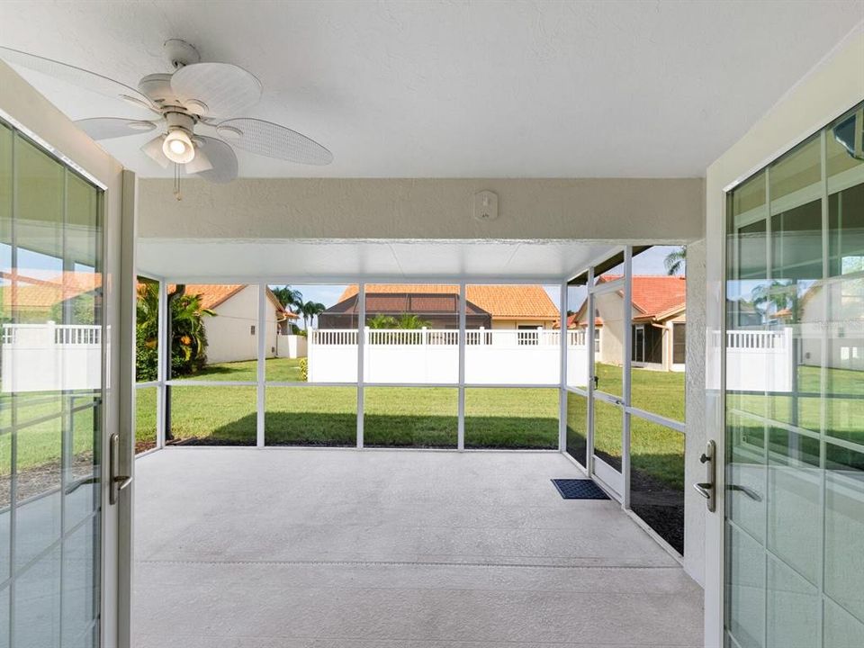 French doors from living area opening onto extended lanai