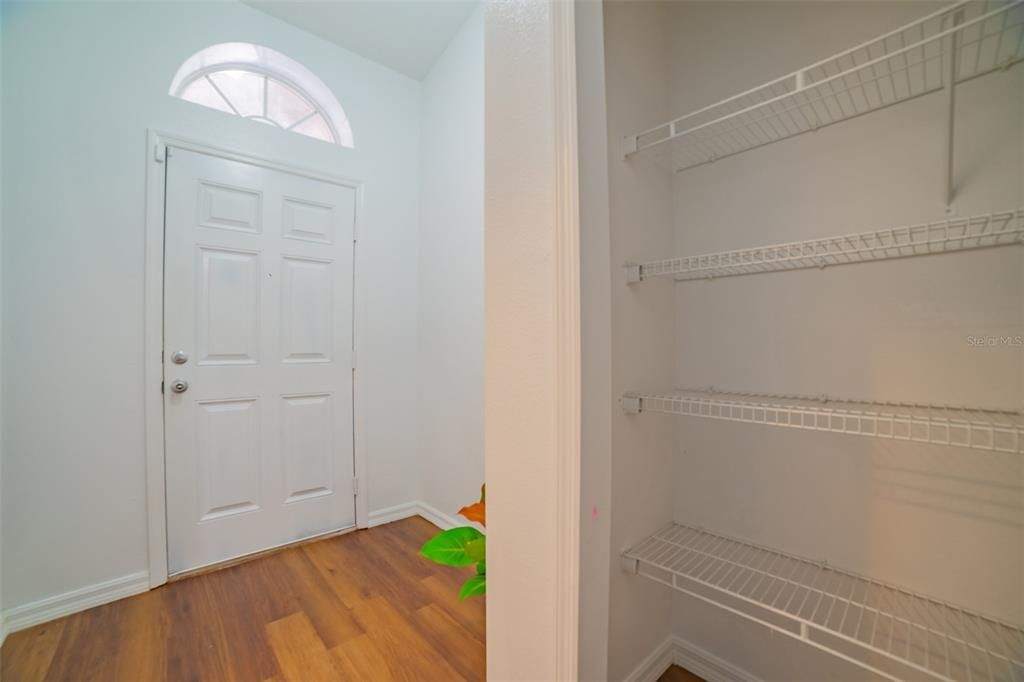 entry foyer with storage closet