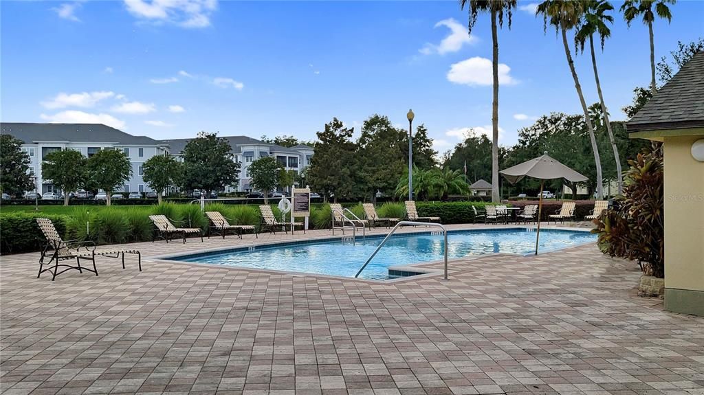 Community Pool Overlooking Lake! The High-end Mall of Millenia Shopping Mall & Dining District is less than 6 minutes away!  Less than 15-20 minutes to DOWNTOWN ORLANDO, Universal Studios, the Disney Theme Parks, DOWNTOWN WINTER PARK and the International Drive Tourist Entertainment District!