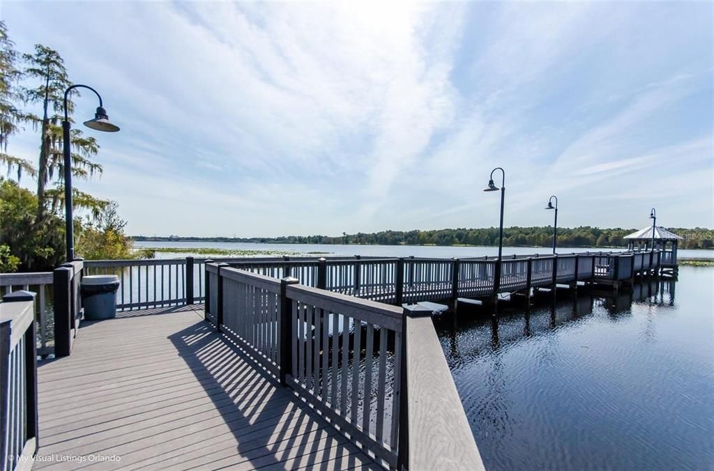 Beautiful lake and walkway on property