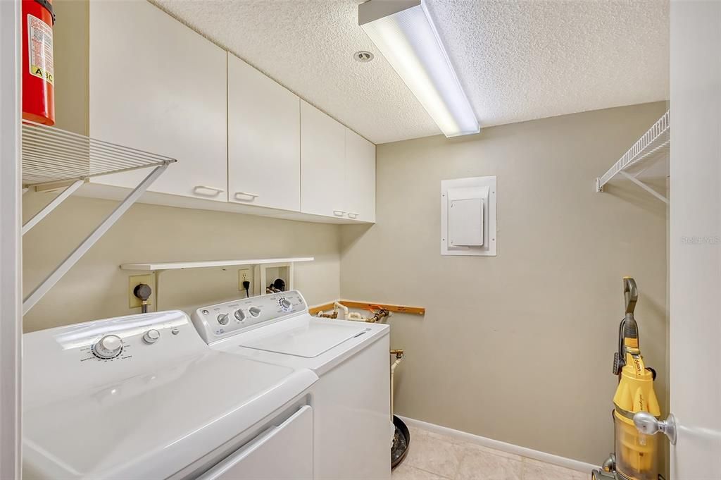 Laundry room with cabinets