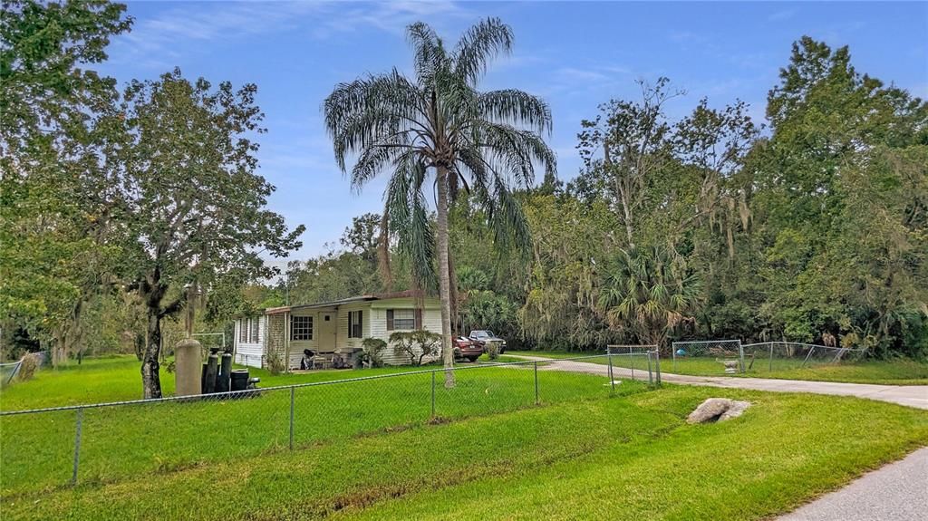 This is the home and land just to the LEFT side of your land when on Luke Street... Your Land is the treeline past the cleared lot here... Build a home just like this...only NICER, BIGGER and NEWER!