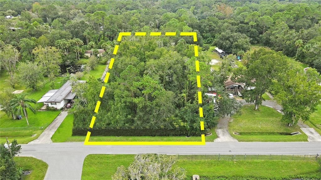 Build your Custom DREAM HOME on this Gorgeous, Buildable ONE-ACRE Vacant Lot in Christmas Park with its RURAL COUNTRY LIVING Feel, yet Very Close to Orlando still! HOLY COW!