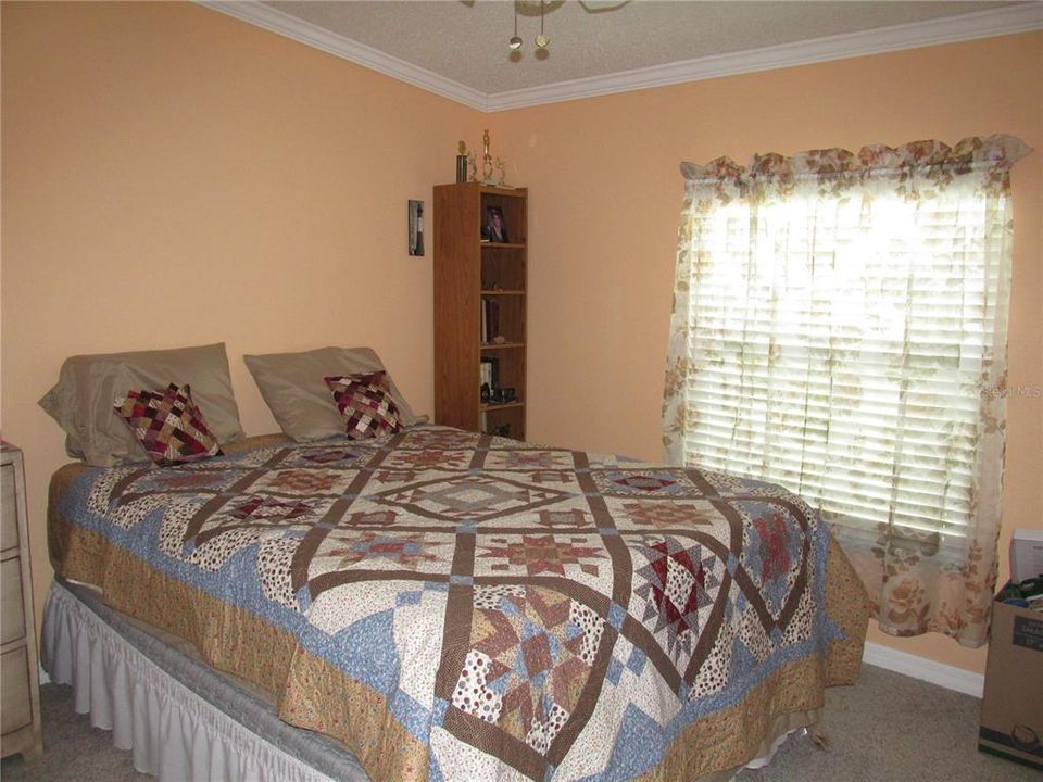 Guest bedroom large enough for your guest to be comfortable and welcome.