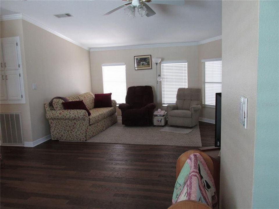 Living room area comfy and cozy for watching all those sports or Christmas movies.