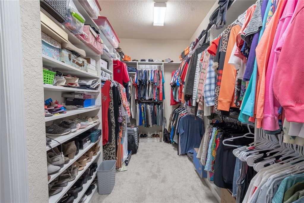 The primary bedroom features a large walk-in closet.