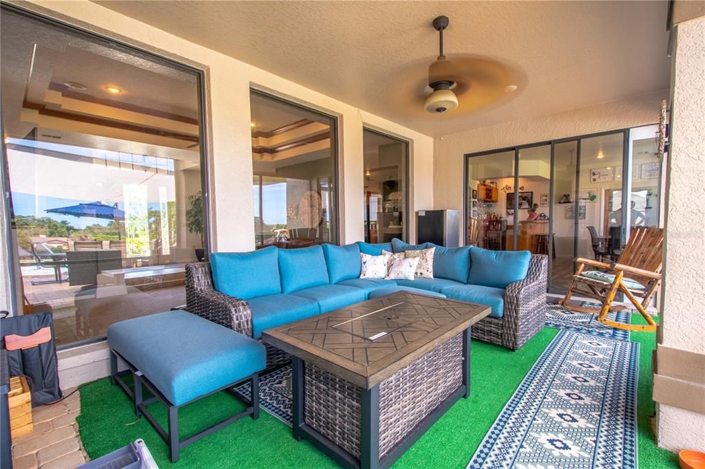 The lanai can be accessed from the family room through sliding glass doors.