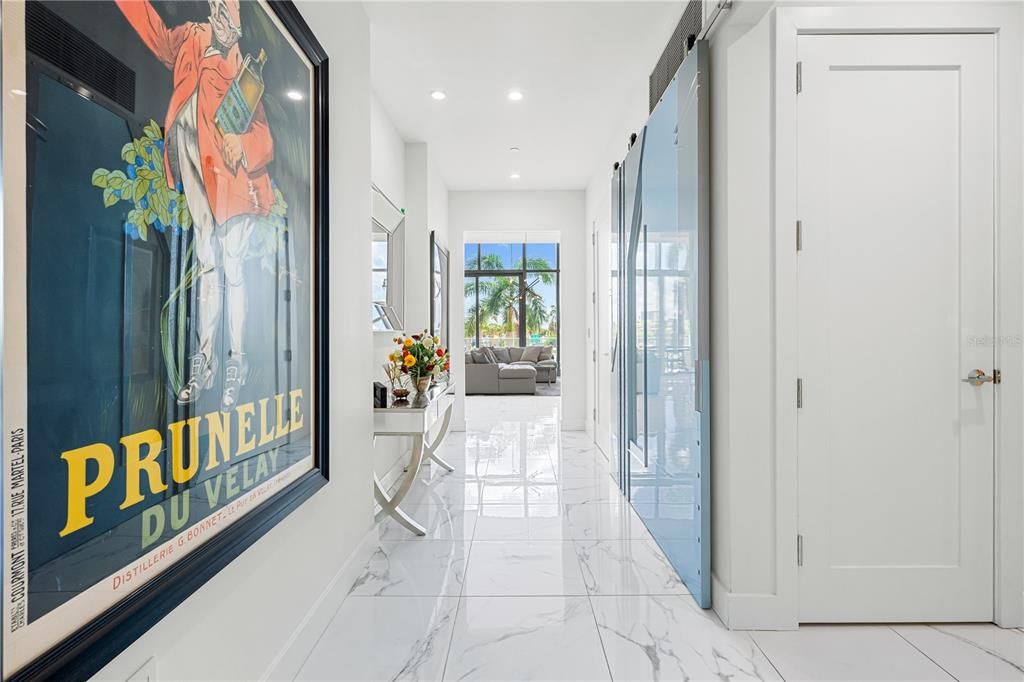 Entrance hall to the great room with 14 foot ceilings.