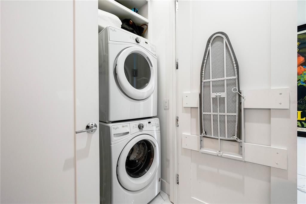 Laundry closet off of the den.