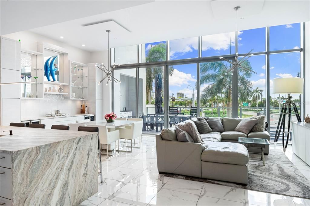 Marble flooring, custom finishes throughout, and a grand patio. One of a kind in downtown Sarasota.