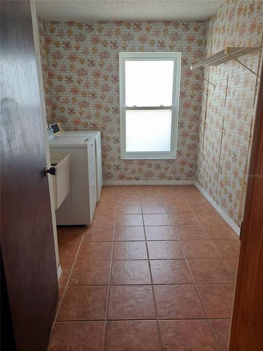 Laundry room and garage entrance.