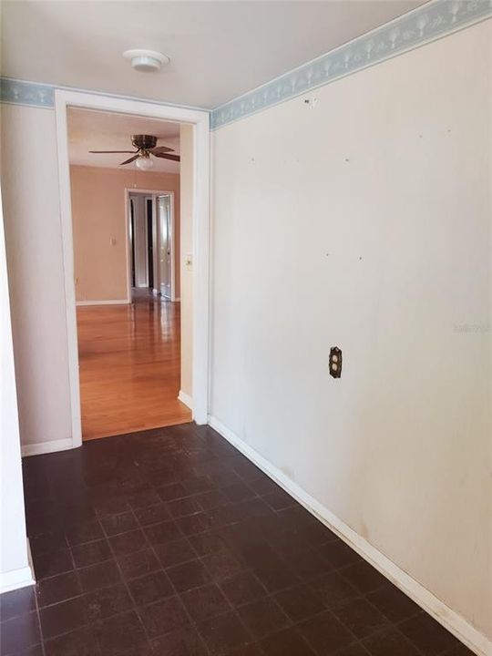 Hallway from entrance to kitchen and family room.