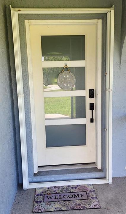 Front door, with hurricane protection.