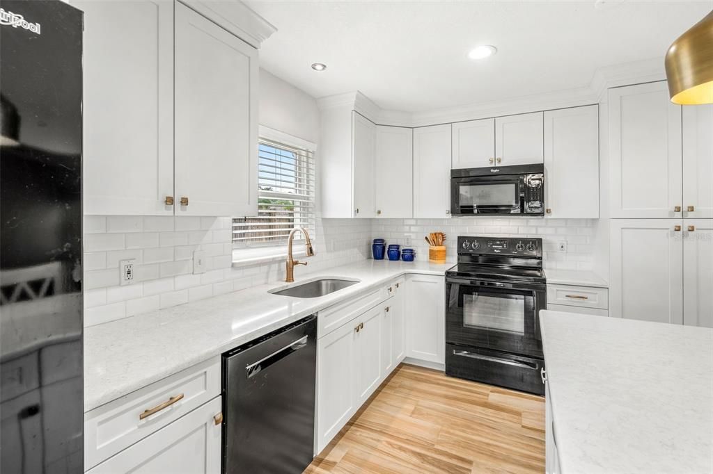 This kitchen has plenty of cabinets & storage