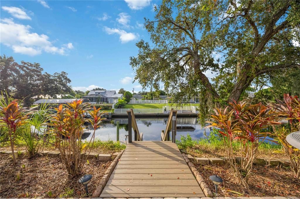 Private walkway and stairs to 28" dock with electric, water, outdoor lighting and WearDeck composite decking. Flexibility to add lift if needed