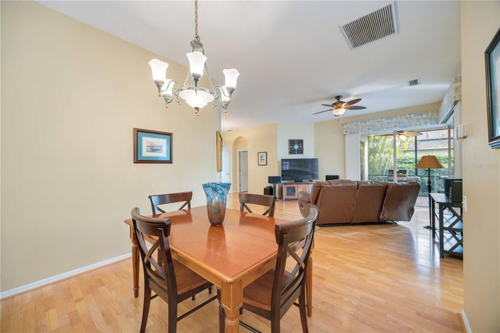 Formal dining room connects to family room and kitchen creating a sense of togetherness