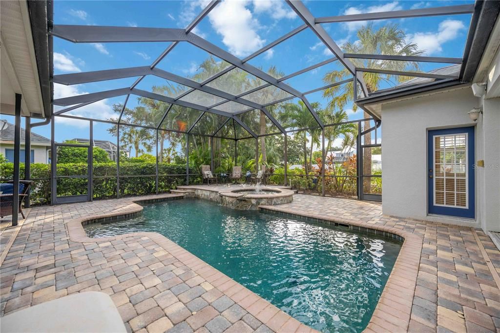 Living room with equipped with rotating tv wall mount making it viewable from the pool/spa and sundeck