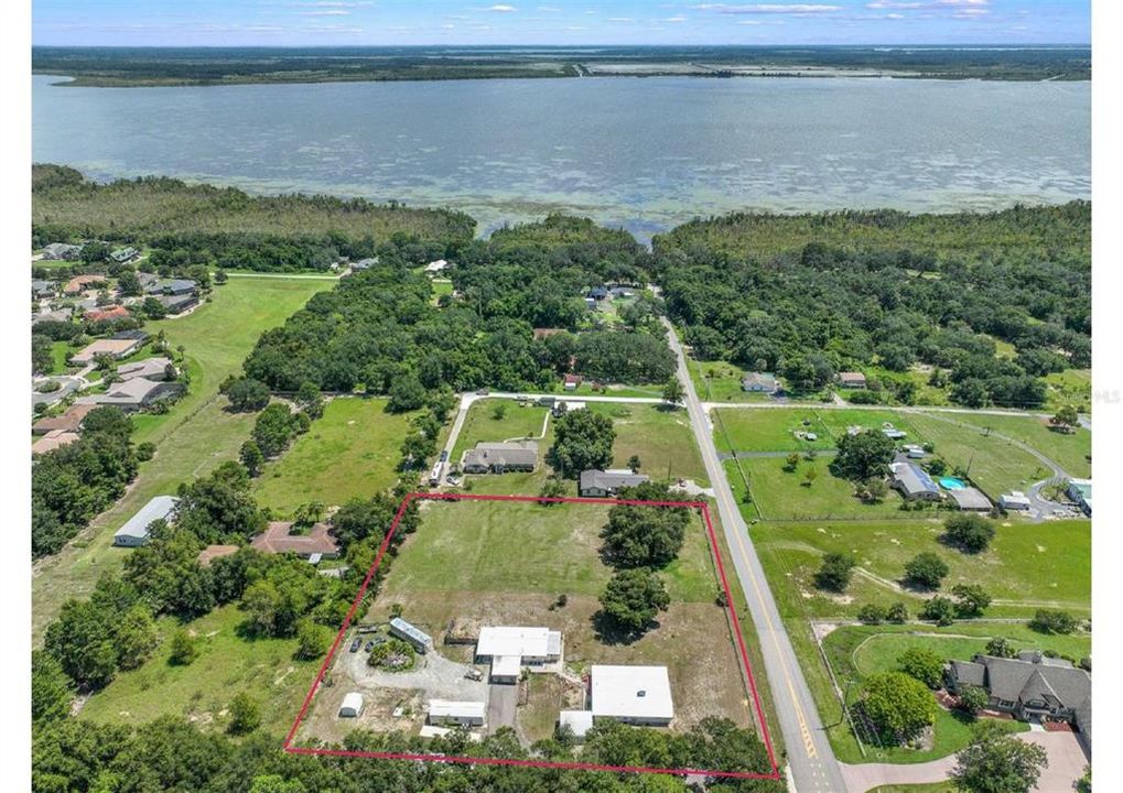 Looking for an “off the grid” lifestyle, family compound or some extra income potential? This unique property on OVER 2 ACRES with VIEWS OF LAKE GRIFFIN is the one for you!