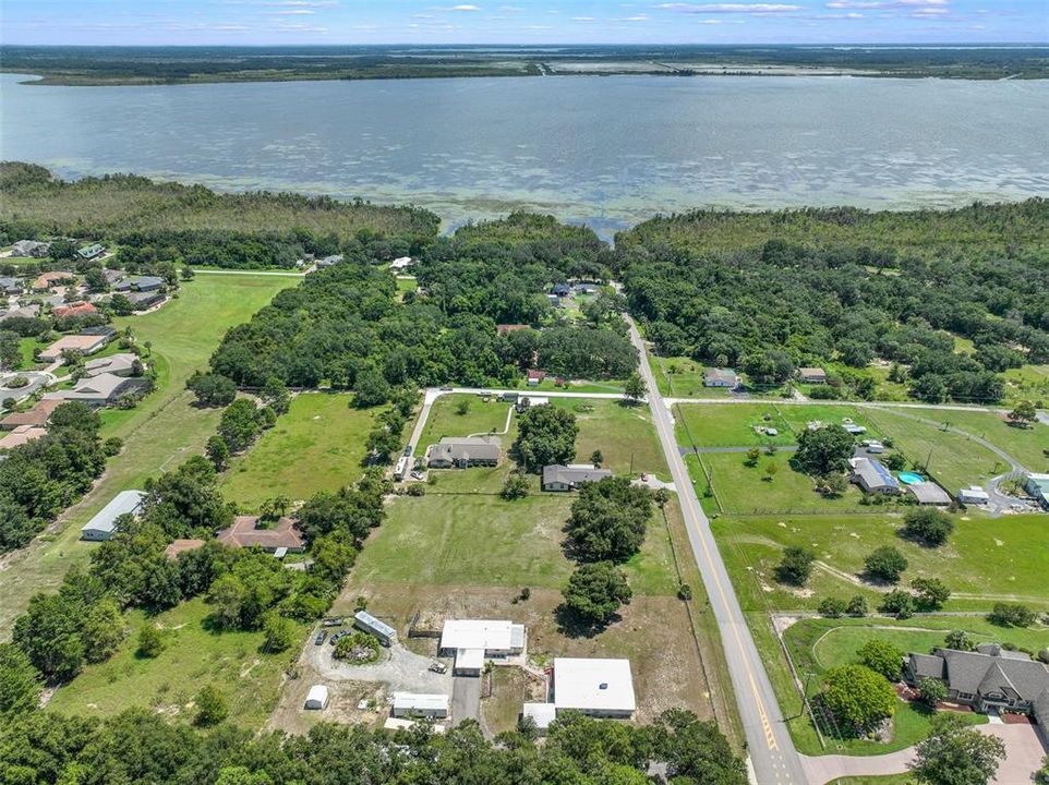 Looking for an “off the grid” lifestyle, family compound or some extra income potential? This unique property on OVER 2 ACRES with VIEWS OF LAKE GRIFFIN is the one for you!