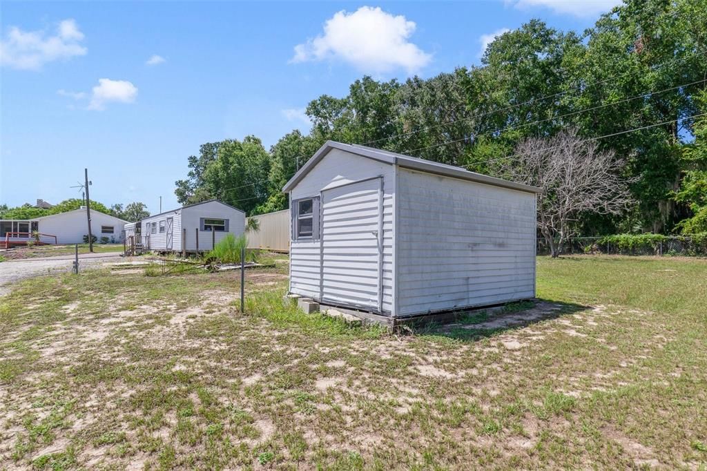 Enjoy easy access to the 441 connecting you to Hwy 27 and the Florida Turnpike putting every convenience at your fingertips while still enjoying the privacy and secluded feeling of this 2.45 ACRES!