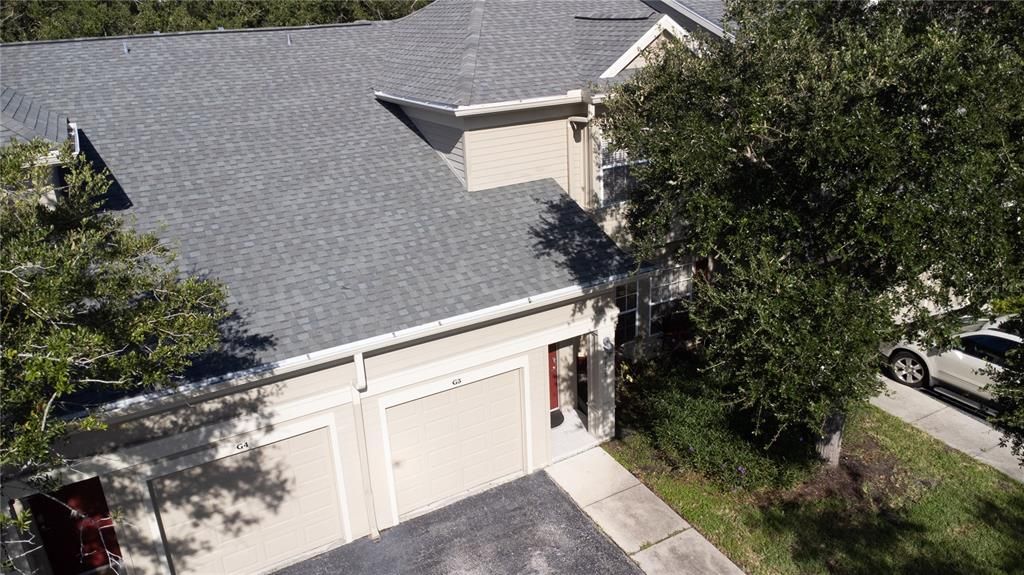 Roof is covered by HOA, newer roof.