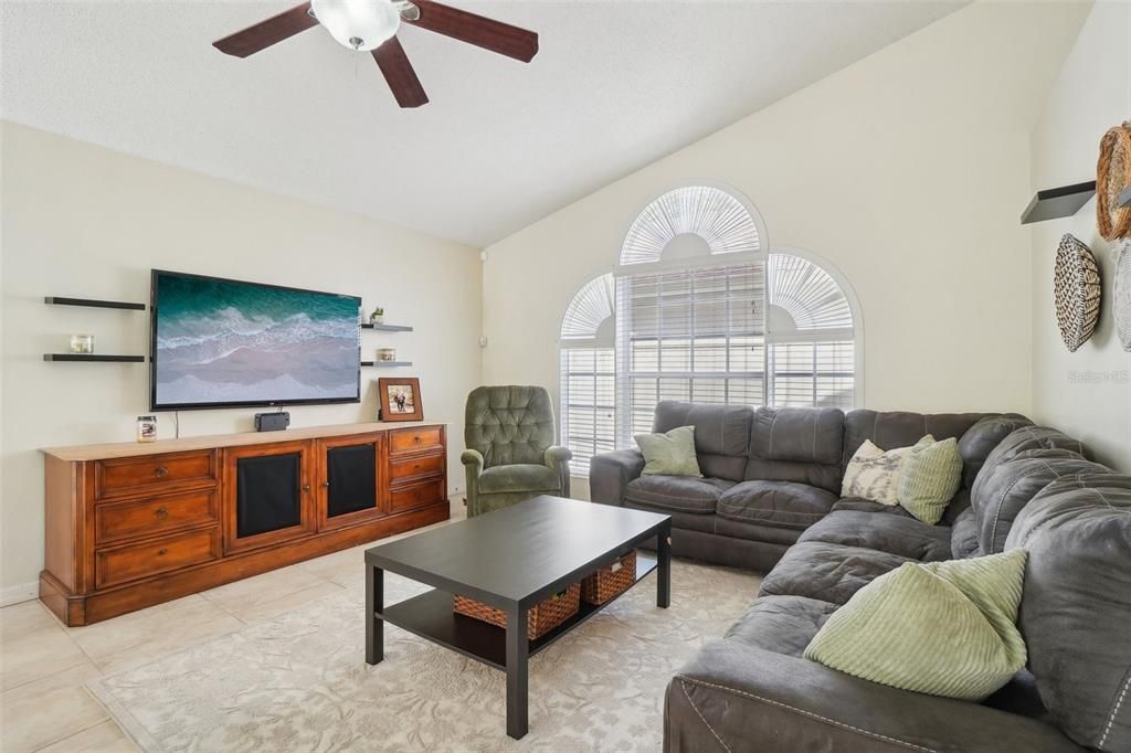 Living room with vaulted ceilings