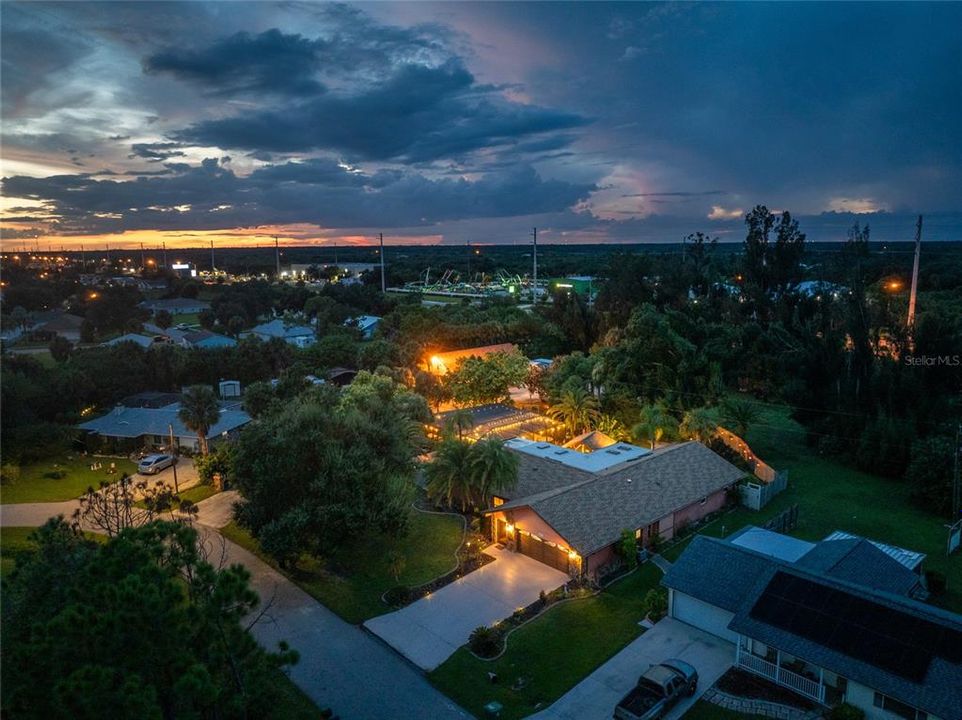 Aerial night view of property