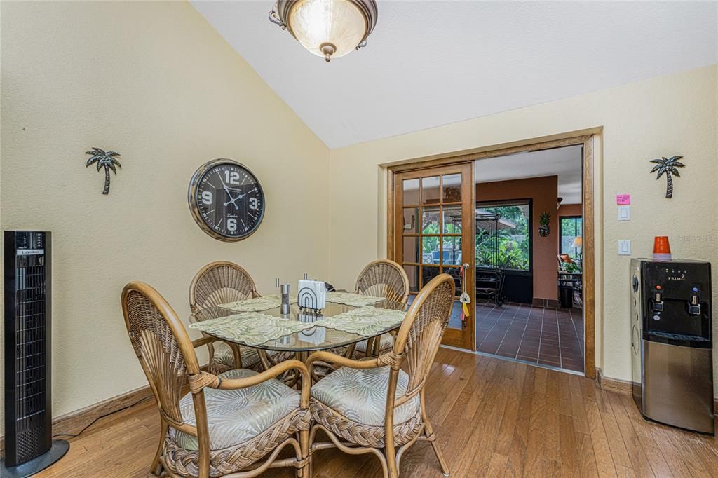 Dining area off of kitchen leads to Florida room